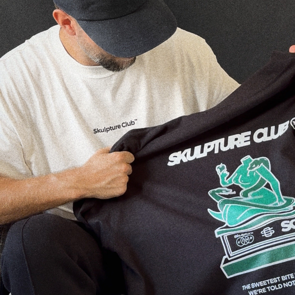 Black and White oversized graphic tee with white Skulpture Club illustration